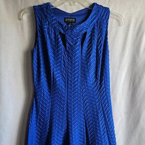 Enfocus Studio size 4 blue dress with pattern and cut outs.